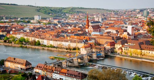 Historic city of Wurzburg with bridge Alte Mainbrucke, Germany.